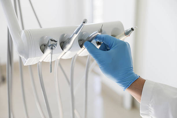 Professional Root Canal Treatment technician working in Earlville, IL